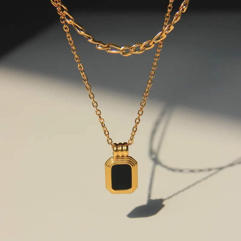 The Golden Embrace Pendant Necklace